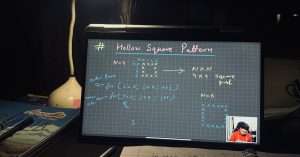 A group of beginners participating in a live coding class via video conference on laptops