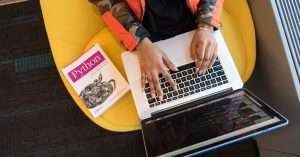 individual studying data science concepts on a laptop
