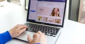 A person using a laptop to check website accessibility features