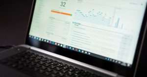 Professional examining a user experience metrics dashboard