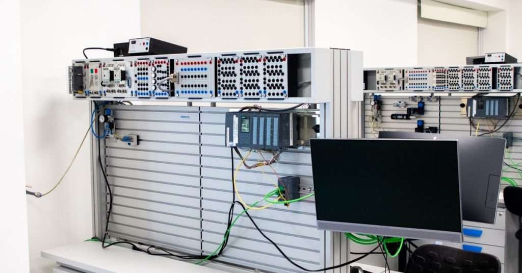 An IT professional configuring servers in a modern office environment