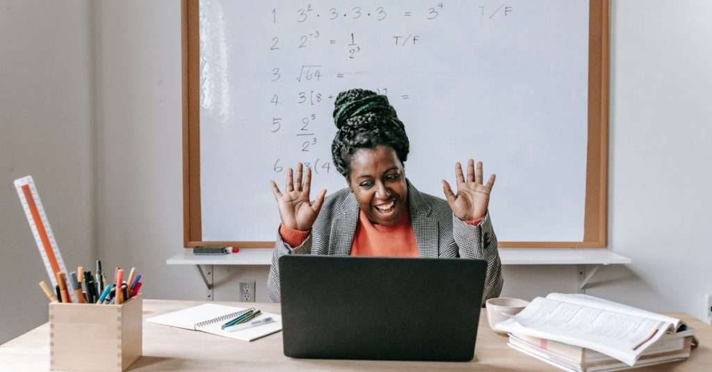 a group of students engaged in an online IT training session