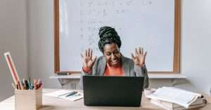 a group of students engaged in an online IT training session