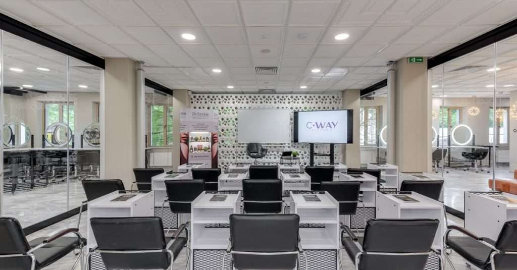A modern classroom with computers ready for IT training